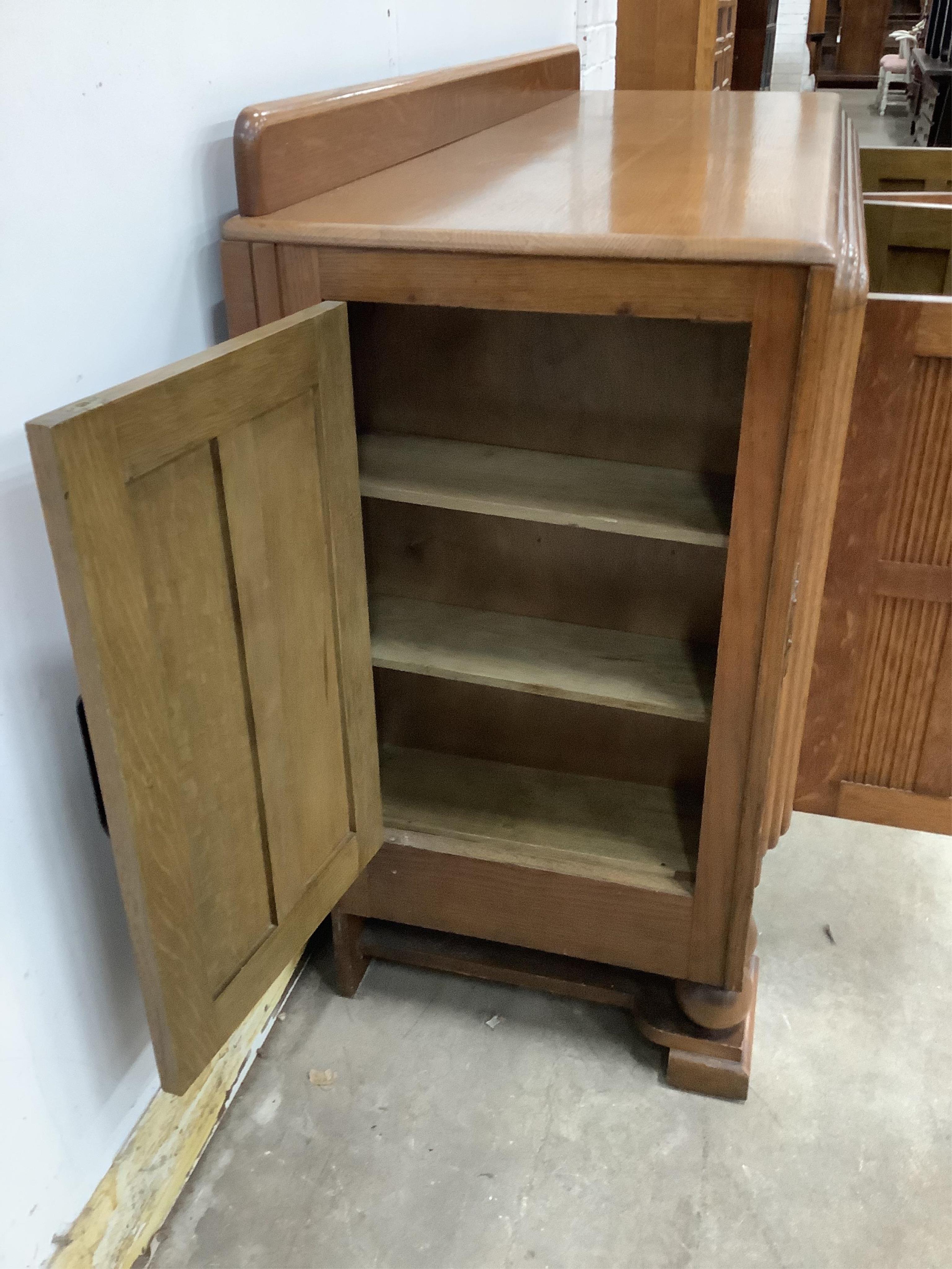 A French Art Deco oak sideboard, width 153cm, depth 52cm, height 99cm. Condition - good